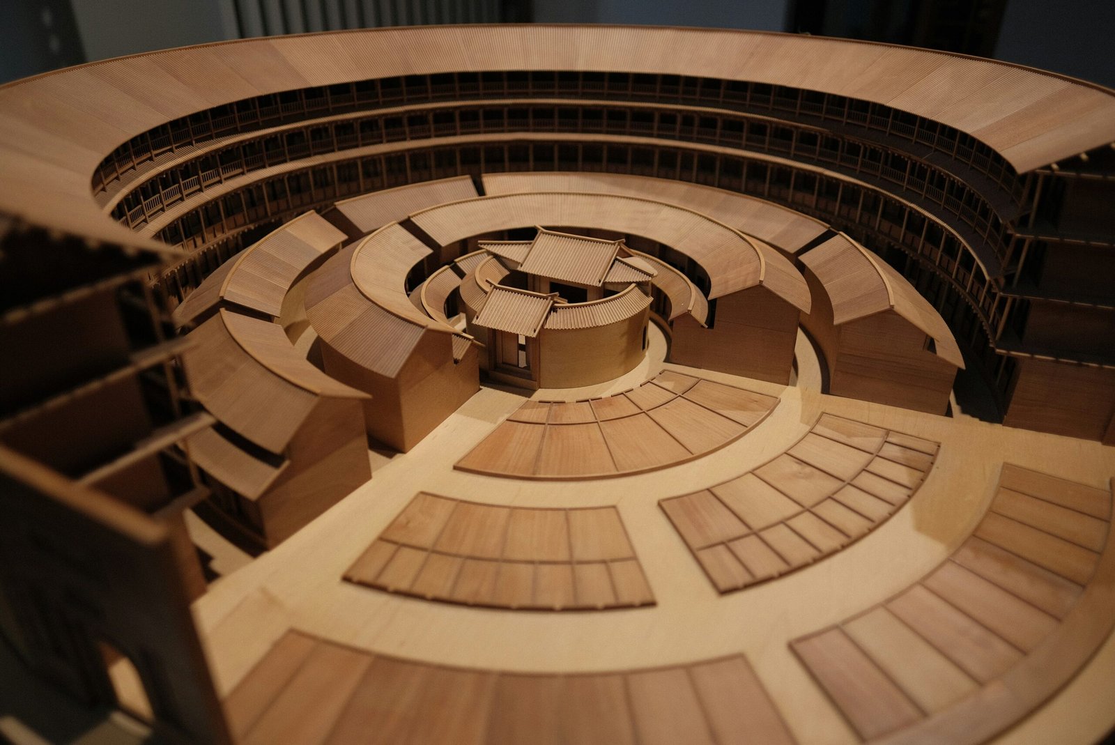 A model of a circular building with windows